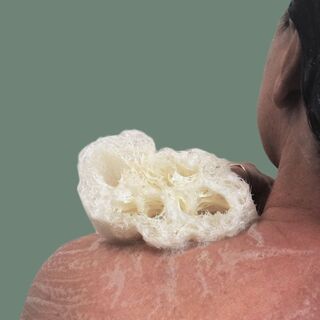 In the shower with a natural loofah sponge
